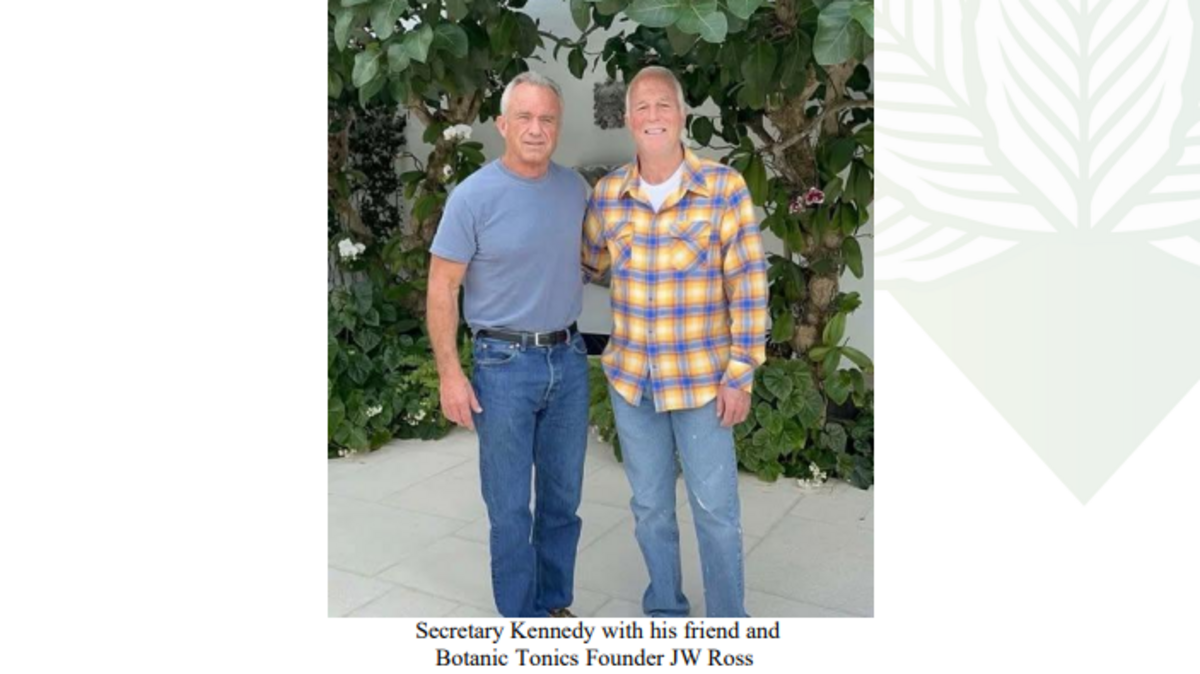 Robert F. Kennedy Jr. and Jerry W. Ross standing together outdoors, over a caption reading Secretary Kennedy with his friend and Botanic Tonics Founder JW Ross